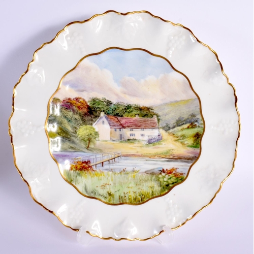 85 - Royal Crown Derby pair of plates painted by W. E. J. Dean, signed,  with named scenes of Monsal Dale... 