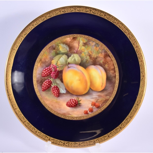 90 - Royal Worcester fine plate painted with fruit on a rich cobalt blue ground with acid etched gilding ... 