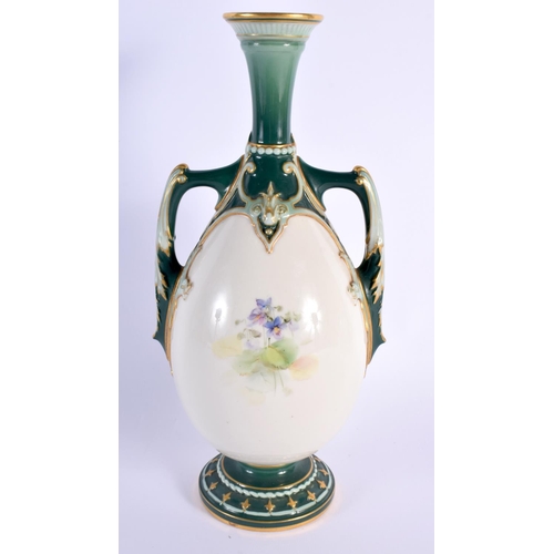 99 - Royal Worcester two handled vase painted with dog roses and wild flowers, with green and gilt border... 