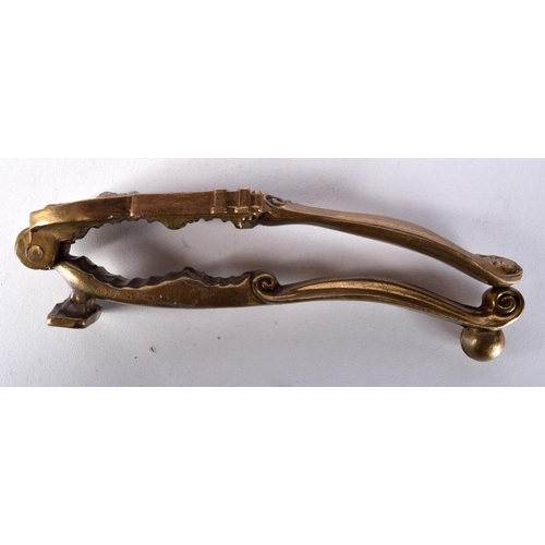 1010 - A PAIR OF ANTIQUE BRONZE NUT CRACKERS. 14 cm x 3 cm.