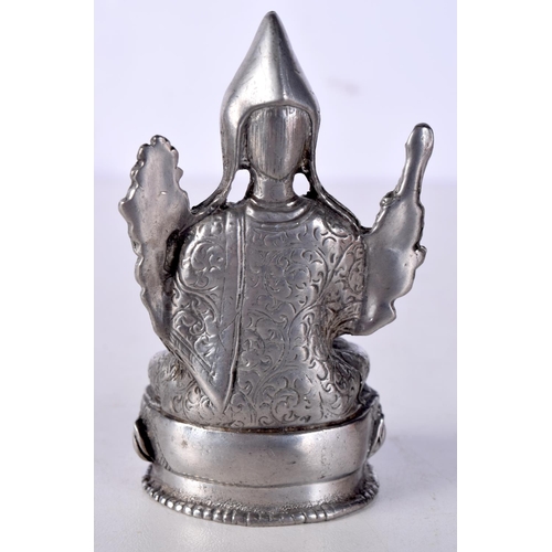 1015 - A CHINESE TIBETAN WHITE METAL FIGURE OF A BUDDHA. 153 grams. 8 cm x 4.75 cm.