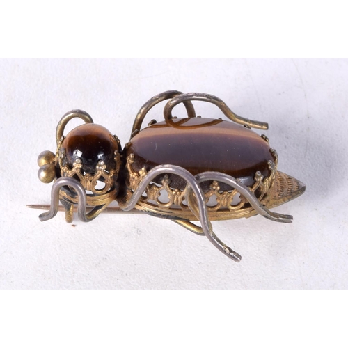 1227 - A VINTAGE TIGERS EYE YELLOW METAL BUG BROOCH. 8.4 grams. Largest 4 cm x 2 cm.