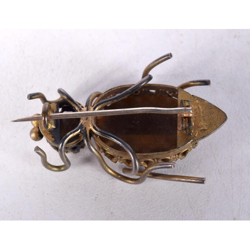 1227 - A VINTAGE TIGERS EYE YELLOW METAL BUG BROOCH. 8.4 grams. Largest 4 cm x 2 cm.