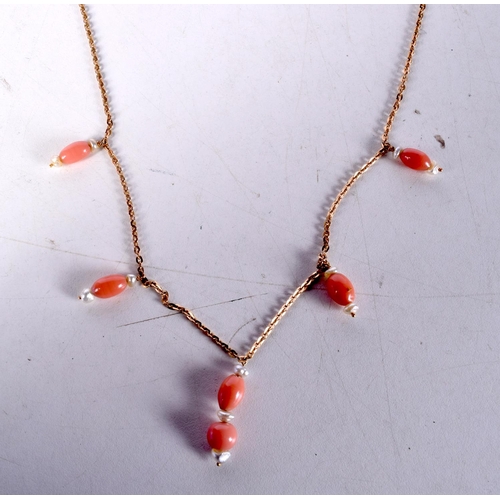 1228 - AN ART DECO 9CT GOLD CORAL AND PEARL NECKLACE. 12.3 grams. 54 cm long.