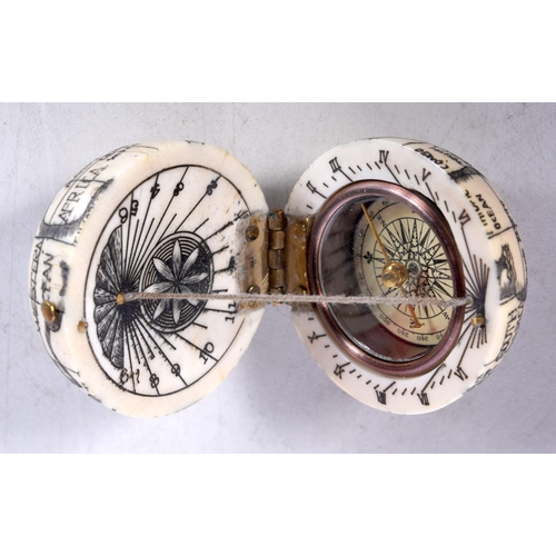 1494 - A BONE COMPASS. 4 cm wide.