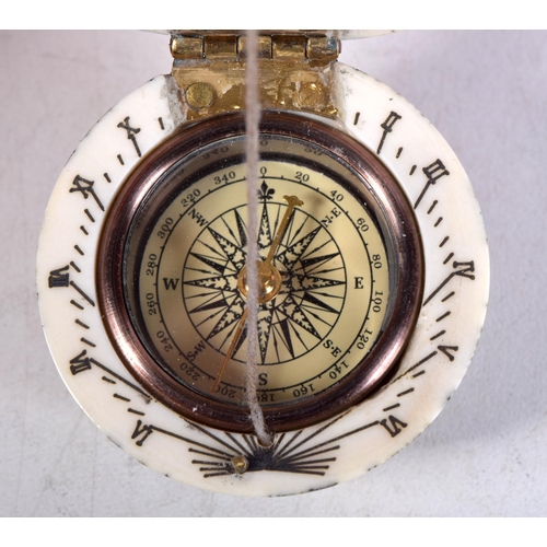 1494 - A BONE COMPASS. 4 cm wide.