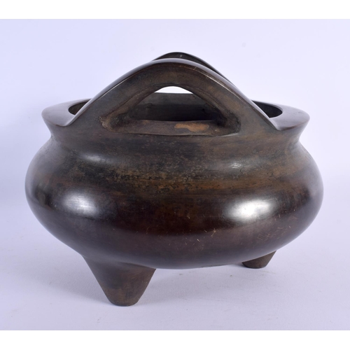 2149 - A LARGE CHINESE TWIN HANDLED BRONZE CENSER 20th Century. 22 cm x 19 cm.