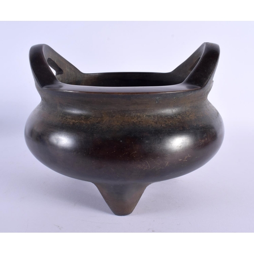 2149 - A LARGE CHINESE TWIN HANDLED BRONZE CENSER 20th Century. 22 cm x 19 cm.