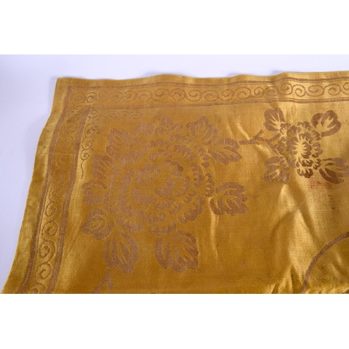 2179 - A 19TH CENTURY CHINESE YELLOW EMBROIDERED SILK COVER Qing. 105 cm square. Note: Sold with paper note... 