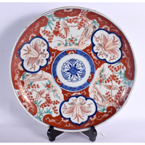 2432 - THREE 19TH CENTURY JAPANESE MEIJI PERIOD IMARI PLATES painted with landscapes. 30 cm wide. (3)