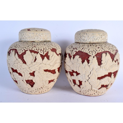 2439 - AN UNUSUAL PAIR OF 19TH CENTURY CHINESE TWO COLOUR CINNABAR LACQUER GINGER JARS AND COVERS decorated... 