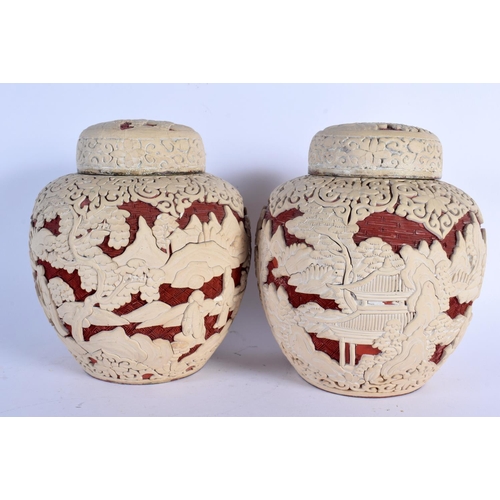 2439 - AN UNUSUAL PAIR OF 19TH CENTURY CHINESE TWO COLOUR CINNABAR LACQUER GINGER JARS AND COVERS decorated... 