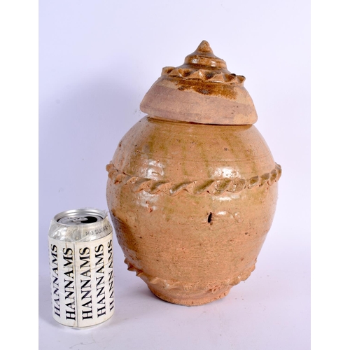 2443 - AN UNUSUAL EASTERN JIN DYNASTY POTTERY JAR AND COVER C317-420 with crimped edges. 30 cm x 15 cm.