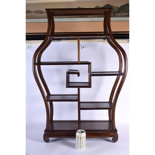 2444 - AN EARLY 20TH CENTURY CHINESE CARVED HARDWOOD DISPLAY STAND Late Qing/Republic. 88 cm x 52 cm.