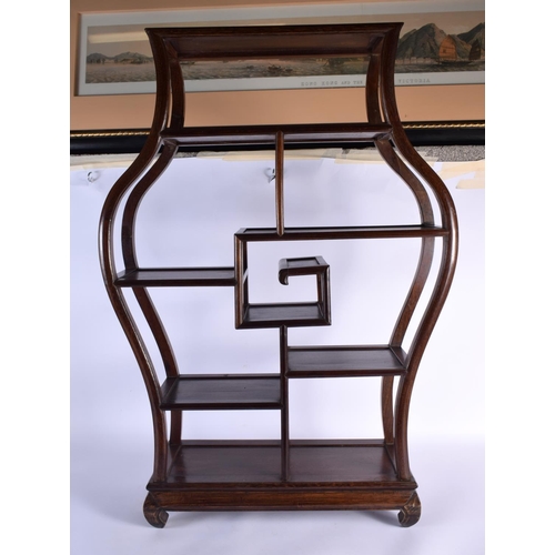 2444 - AN EARLY 20TH CENTURY CHINESE CARVED HARDWOOD DISPLAY STAND Late Qing/Republic. 88 cm x 52 cm.