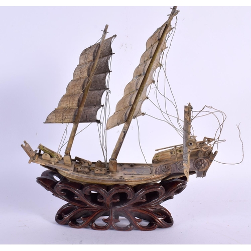 2448 - A LATE 19TH CENTURY CHINESE EXPORT SILVER JUNK BOAT Qing. 24 cm x 21 cm.