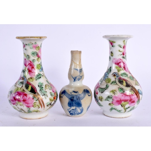 2449 - A MINIATURE 17TH/18TH CENTURY CHINESE BLUE AND WHITE VASE together with a saucer, pair of vases etc.... 