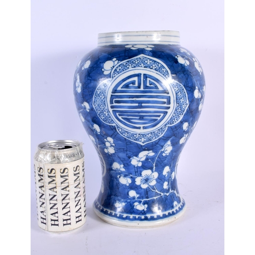 2455 - A LARGE LATE 17TH/18TH CENTURY CHINESE BLUE AND WHITE VASE Kangxi/Yongzheng, painted with flowers. 2... 