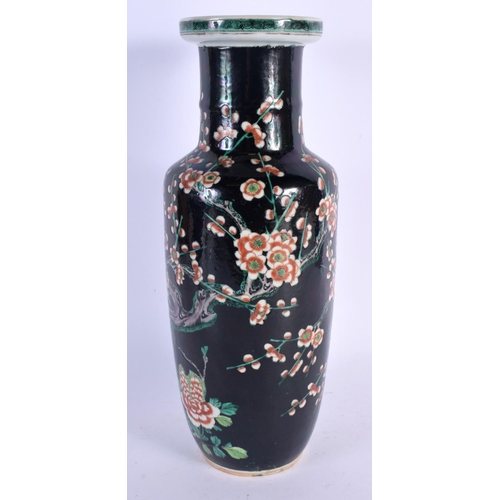 2456 - A LARGE 19TH CENTURY CHINESE FAMILLE NOIRE ROULEAU VASE bearing Kangxi marks to base. 34 cm x 12 cm.