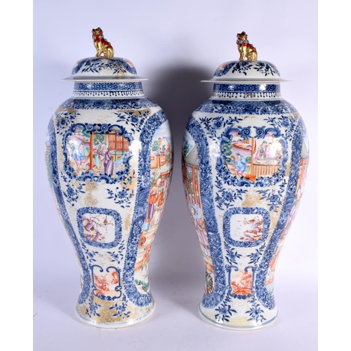 2460 - A VERY LARGE PAIR OF 18TH CENTURY CHINESE EXPORT BLUE AND WHITE VASES AND COVERS Qianlong, painted w... 