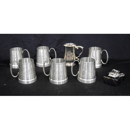 3213 - A collection of Pewter mugs together with plated mug etc 13cm (8).