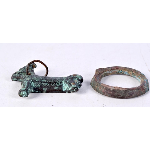 3593 - A Central Asian bronze of a Ram and a early bronze ring 6 cm (2)