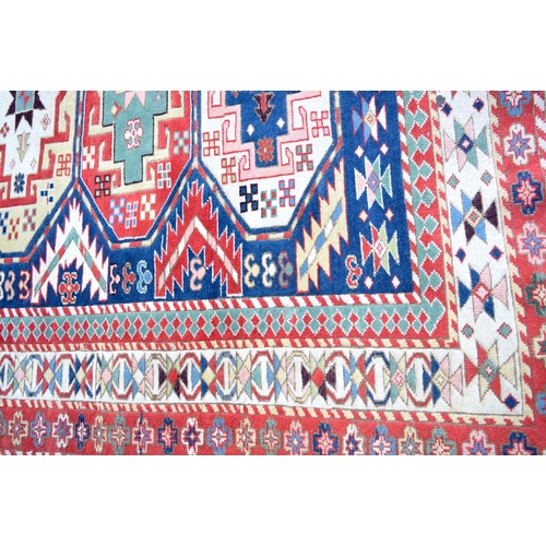 3992 - A Kazac rug 142 x 122 cm.