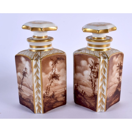 185 - 19th c. Paris porcelain pair of scent bottles painted in sepia with landscapes. 14 cm x 5 cm.