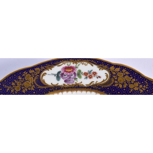 196 - Sevres plate, the centre painted with three floral sprays, the blue-de-roi border with three gilt fl... 
