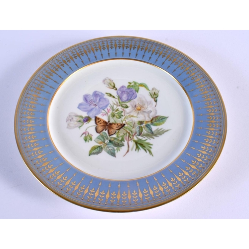 198 - Sevres plate painted with a bouquet of flowers and a butterfly under a light blue and gilt border ma... 