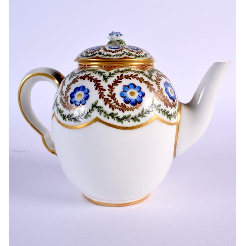 199 - Sevres teapot and cover painted with flowers surrounded by green and gold leafy chains, interlaced L... 