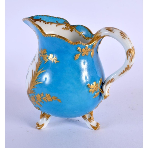 201 - Sevres blue celeste three footed milk jug painted with birds in the style of Oncle, interlaced Ls i... 