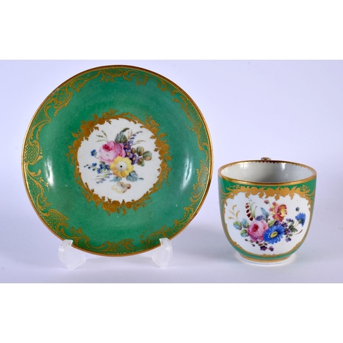 207 - Sevres coffee cup and saucer painted with flowers on a green and gilt ground, BD mark for Baudoin, i... 