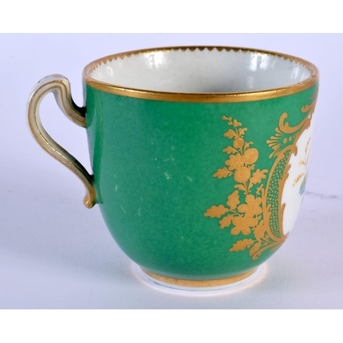 207 - Sevres coffee cup and saucer painted with flowers on a green and gilt ground, BD mark for Baudoin, i... 