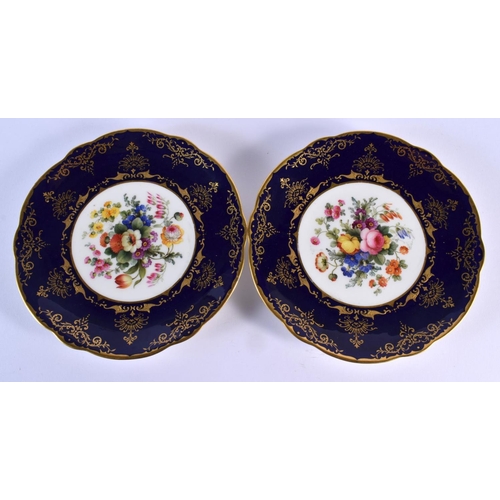 213 - Coalport pair of shaped circular plates, painted by F. Howard, signed with flowers, cobalt blue and ... 