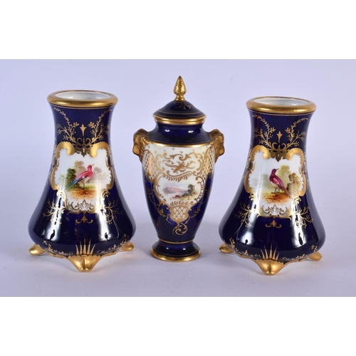 214 - Late 19th Coalport vase and cover painted with a loch scene on a blue ground and a pair of Coalport ... 