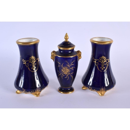 214 - Late 19th Coalport vase and cover painted with a loch scene on a blue ground and a pair of Coalport ... 