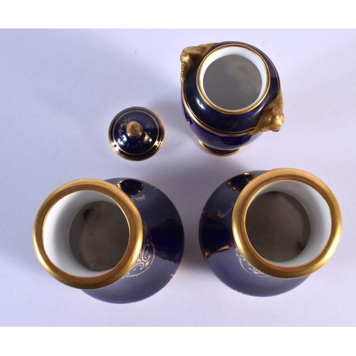214 - Late 19th Coalport vase and cover painted with a loch scene on a blue ground and a pair of Coalport ... 