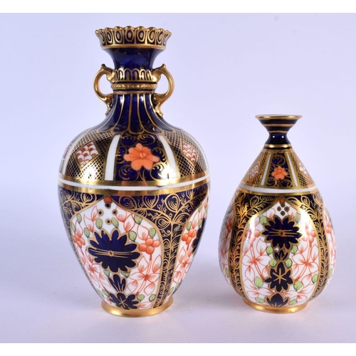 216 - Royal Crown Derby 1128  vase of pear shape and a larger RCD two handled vase also 1128 date mark 192... 