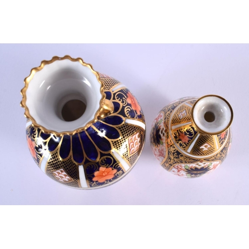 216 - Royal Crown Derby 1128  vase of pear shape and a larger RCD two handled vase also 1128 date mark 192... 