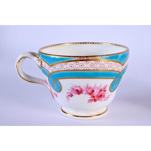 218 - 19th c. Minton teacup and saucer entwined handle painted with two turquoise borders, a peacock eye b... 