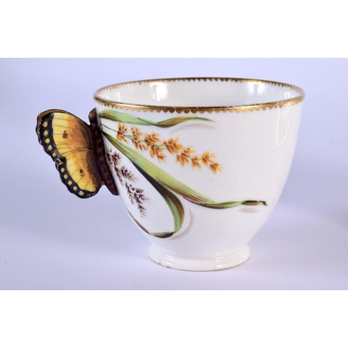 219 - 19th c. English porcelain butterfly handled coffee cup and moulded saucer painted with wild flowers ... 
