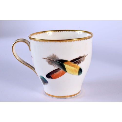 221 - Minton's coffee cup and saucer, painted with a bird in flight above its nesting young, the border wi... 