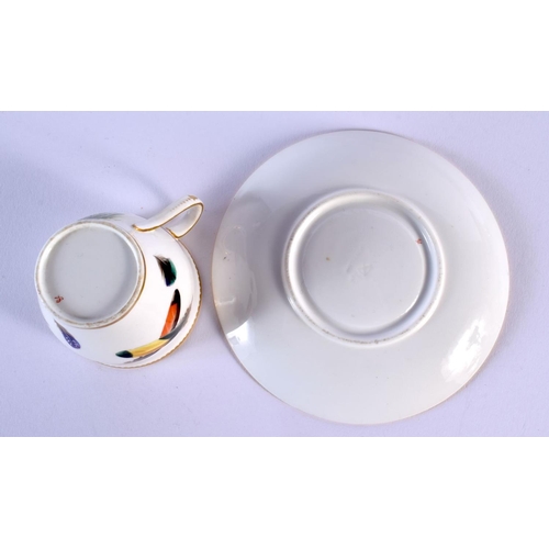 221 - Minton's coffee cup and saucer, painted with a bird in flight above its nesting young, the border wi... 