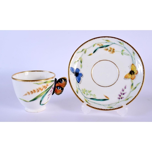 222 - 19th c. English porcelain butterfly handled coffee cup and moulded saucer painted with wild flowers ... 