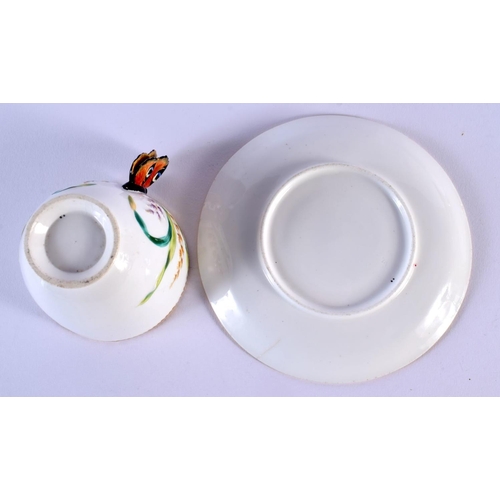 222 - 19th c. English porcelain butterfly handled coffee cup and moulded saucer painted with wild flowers ... 