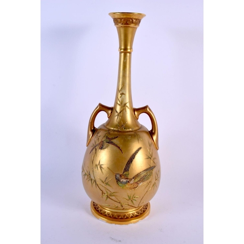 240 - Royal Worcester rare gold ground two handled vase decorated in Japanese style with a hummingbird and... 