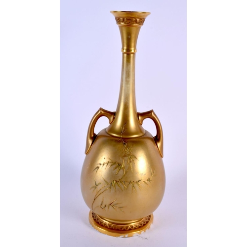 240 - Royal Worcester rare gold ground two handled vase decorated in Japanese style with a hummingbird and... 