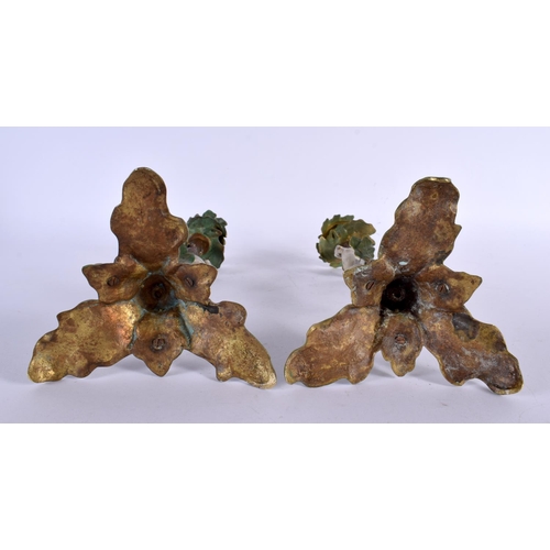 409 - A PAIR OF CONTINENTAL COLD PAINTED BRONZE CANDLESTICKS formed with squirrels climbing on a tree. 29 ... 