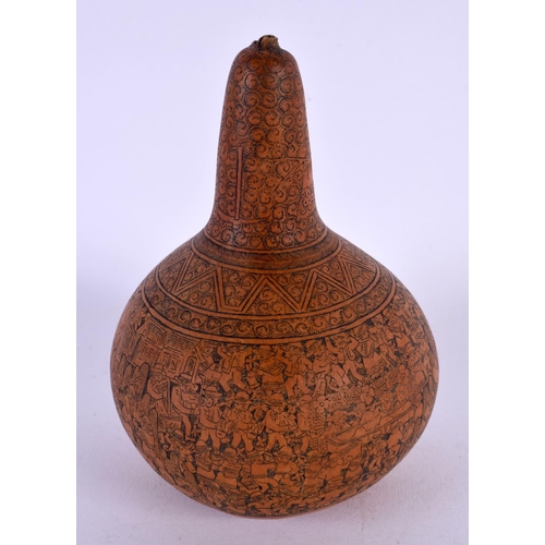 410 - AN ANTIQUE CONTINENTAL CARVED AND ENGRAVED GOURD NUT. 14 cm x 7 cm.